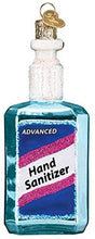 Load image into Gallery viewer, Old World Christmas Hand Sanitizer Ornament
